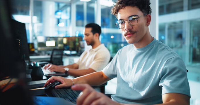 Computer, programmer and glasses with man in office for game designer, coding app and ux update. Software development, research and level gameplay with employees at night for coworking project