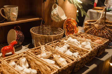 Sale of handmade ceramic Christmas tree toys at the Christmas Fair. Black Friday for the winter...