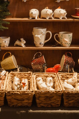 Sale of handmade ceramic Christmas tree toys at the Christmas Fair. Black Friday for the winter holidays.