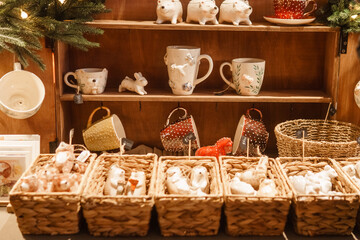 Sale of handmade ceramic Christmas tree toys at the Christmas Fair. Black Friday for the winter...
