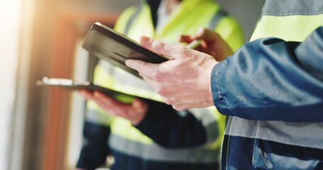 Naklejka premium Hands, construction worker and tablet for meeting, review and team with safety report at site. People, engineer and architect with touchscreen, checklist and application for survey at property