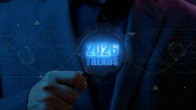 Magnifying glass focus on the text 2026 trends and seeking new opportunities business. Target purpose for change improvement. Business marketing searching and planning concept.
