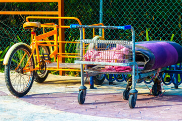 Mexican tricycle on the beach palm trees in Mexico.