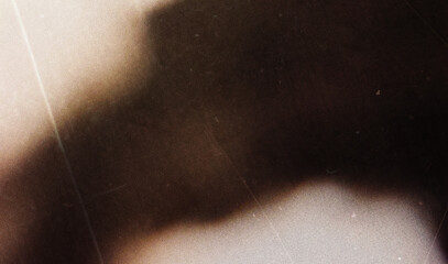 Obraz premium Grunge overlay. Grain noise. Weathered texture. Orange brown black color creased defect on dark rough surface illustration abstract background.