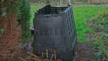 Plastic Compost Bin in Backyard Garden for Ecological Sustainable Plant Growth