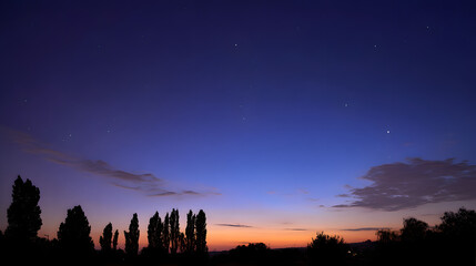 The sky is dark and the stars are shining brightly