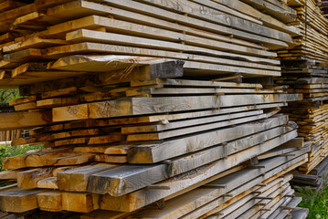 stacked wooden planks texture background detail of sawn timber drying in layers detail of sawn...