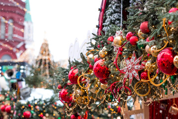 Fabulous Christmas background. Festive toys on the New Year tree in Moscow. The concept of...