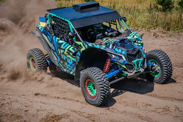 ATV (quad), buggy and UTV in the sand. Amateur competitions