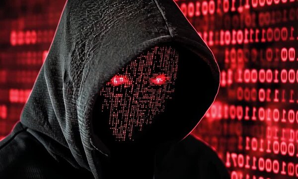 silhouette Anonymous hacker in dark hoodie on red digital background . Red matrix background represents cybersecurity threats, hacking risks and digital anonymity. Cybercrime and online security conce