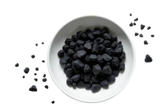 Activated-charcoal-pellets-in-bowl-detox-supplement-health-wellness