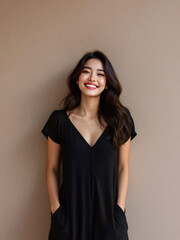Naklejka premium Happy woman in black top smiling, indoor warm setting.