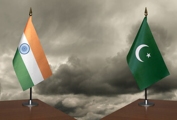Table flags India and Pakistan a stormy sky in the background