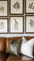 Cozy living room with nature-inspired wall art featuring framed botanical prints on a neutral wall