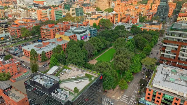 Tilt down aerial view of the exclusive 93 park in the most affluent neighborhood of the Colombian capital, Bogota, an area of shopping malls and restaurants.