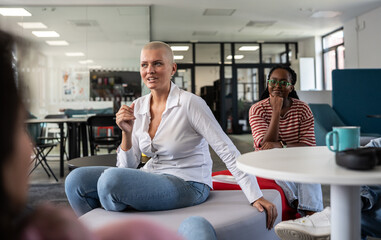 In a student support center at the creative office, two students of varied backgrounds gather to advance causes like human rights and race equality.	
