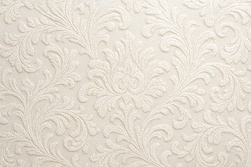 Elegant cream damask fabric with an embossed floral pattern and soft texture. This classic woven textile is ideal for use in upholstery, interior design, fashion accents, as a decorative backdrop