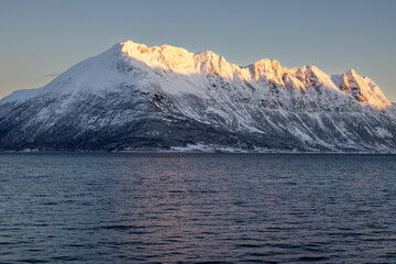 Mountains with snow in sunrise, Hamnvik, Norway