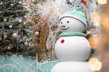 Beautiful Christmas background with a snowman. The concept of preparing and decorating for the new...