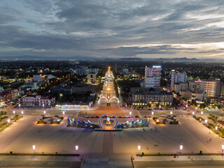 Vinh city skyline at dusk highlighting Nguyen Tat Thanh square and surrounding urban landscape