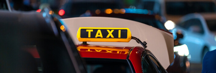 Taxi Moving Through City Traffic