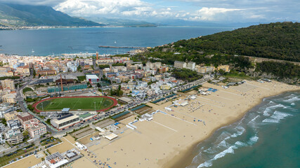 Fototapeta premium Aerial view of Serapo beach overlooking the Mediterranean Sea. It is the main sandy beach of Gaeta, in the province of Latina, Lazio, Italy. 