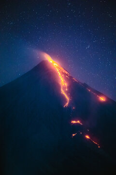 Mayon volcano with lava flow at night, Albay, Philippines
