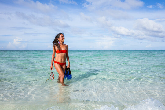 Asian woman with snorkeling gear, Camiguin Island, Philippines
