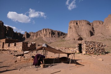 Nomad settlement and amazing mountain landscapes of Jebel Saghro with volcanic rocks eroded by wind and time. Atlas, Anti Atlas, Morocco © Iwona