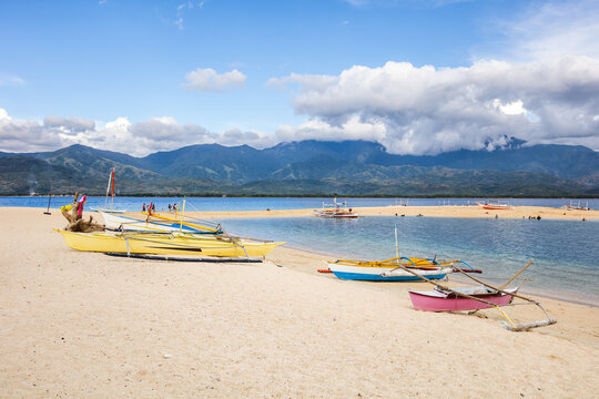 Tropical beach with wooden boats, Mararison island, Antique, Philippines