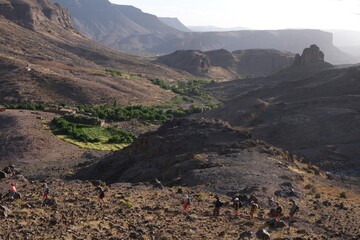 Amazing mountain landscapes of Jebel Saghro with volcanic rocks eroded by wind and time and little...