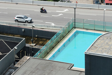 Aerial View of Rooftop Pool near road in Kuala Lumpur