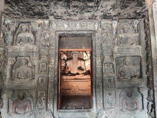 Ajanta and Ellora Caves, UNESCO World Heritage Sites in Maharashtra, India, showcase ancient rock-cut architecture, intricate carvings, and mesmerizing murals. Ajanta, known for its Buddhist caves, fe