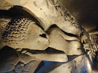 Ajanta and Ellora Caves, UNESCO World Heritage Sites in Maharashtra, India, showcase ancient rock-cut architecture, intricate carvings, and mesmerizing murals. Ajanta, known for its Buddhist caves, fe