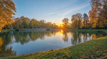 Scenic Autumn Bridge over Tranquil River at Sunset