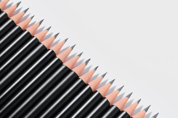 Many sharp graphite pencils isolated on white