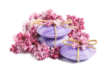 Soap bars and lilac flowers isolated white