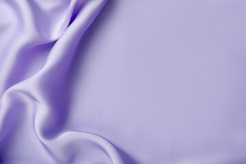 Fototapeta premium Crumpled violet silk fabric as background, top view. Space for text