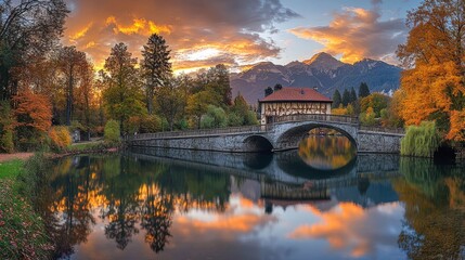 Scenic Autumn Bridge over Tranquil River at Sunset