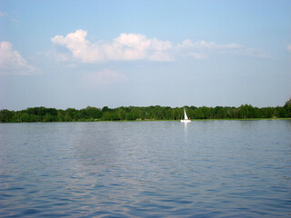sailboat boat floats on the lake