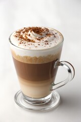 Obraz premium cup of macchiato with chocolate isolated