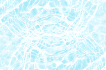 Blue water with ripples on the surface. Defocus blurred transparent blue colored clear calm water surface texture with splashes and bubbles. Water waves with shining pattern texture background.