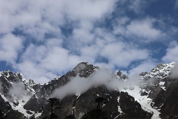 Darjeeling and Sikkim, nestled in the eastern Himalayas, offer breathtaking mountain landscapes, serene monasteries, and lush tea gardens. 