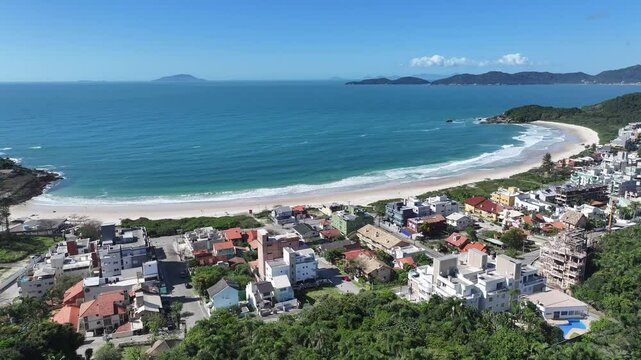 Quatro Ilhas Beach In Bombinhas Santa Catarina Brazil. Turquoise Ocean Waves Gently Crashing On Tropical Beach. Shore Clouds Beach Sea. Outside Beach Panoramic. Bombinhas Santa Catarina.