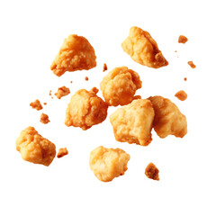 Crispy fried chicken nuggets falling isolated on a white background