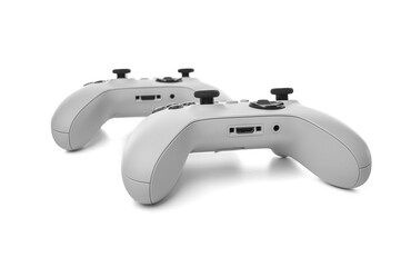 Modern white gaming controller with black buttons and joysticks, designed for ergonomic and...