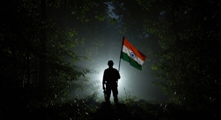 Solitary figure holding Indian flag amid the dense misty forest silhouette serene landscape