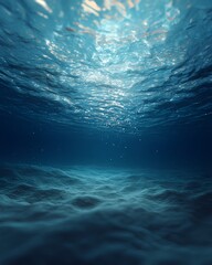 A serene underwater view with light blue tones and sunlight streaming through the surface