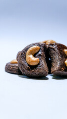 photo of chocolate flavored nastar cake with cashew nut topping on top