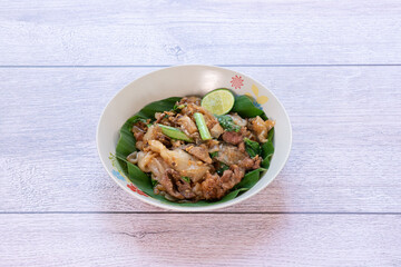 a Thai dish that consists of rice noodles fried with egg, vegetables, and spices, sometimes with...